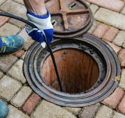Drain cleaning through an outdoor access point